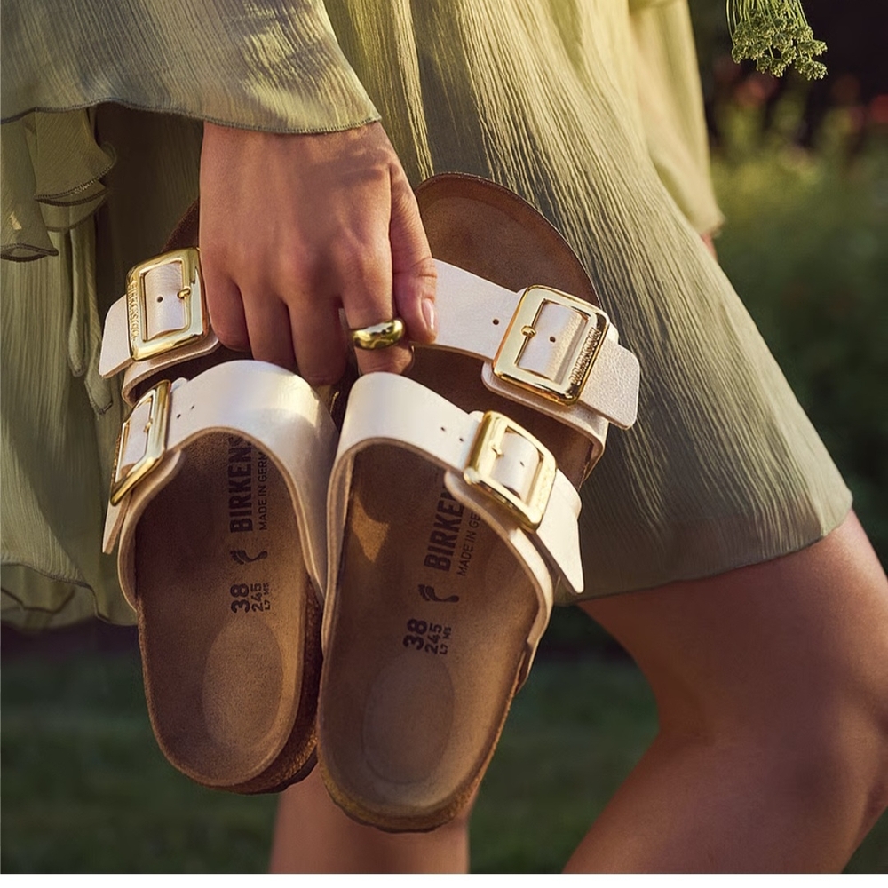 Birkenstock Women's Cream Sandals with Gold Buckles